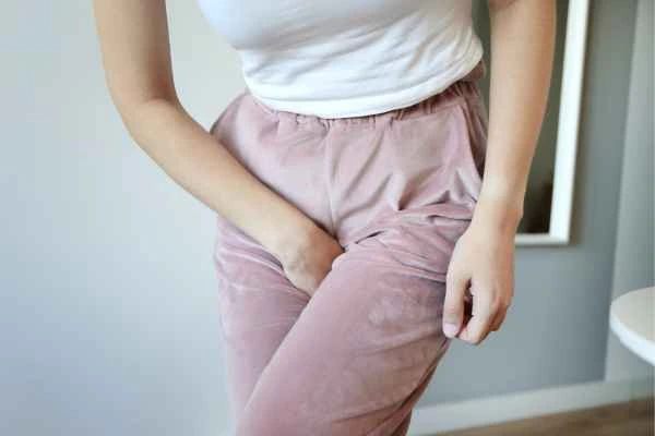 older woman running to the toilet because of urinary incontinence Bow